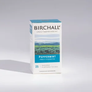 A box of Birchall Peppermint Tea Bags Naturally Caffeine-free contains 15 prism tea bags, ideal for any café environment. The packaging showcases mountain imagery and features labels indicating its caffeine-free nature, proudly displaying the Great Taste award logo—it’s an excellent choice for baristas looking to offer a refreshing beverage.