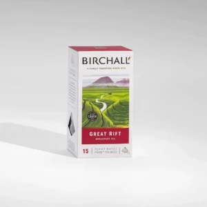 The Birchall Great Rift Breakfast Blend Tea, ideal for any café or barista, come in packaging adorned with an illustration of mountains and fields. The label proudly showcases "East Africa's Finest Tea," along with "15 Prism Tea Bags" and a distinguished "Great Taste" award symbol.