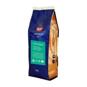 A blue and brown 1kg bag of Café Rico coffee, labeled Café Mundo, awaits the discerning barista. It highlights details like roast type, strength, and origin, with contact information and café social media icons elegantly displayed on the side.