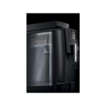 Close-up of the Jura WE6 Tanked Bean to Cup Coffee Machine, a sleek and modern black coffee machine set against a dark backdrop, evoking the professional tools of a barista. This machine boasts a digital interface and an elegant spout for dispensing café-quality coffee.